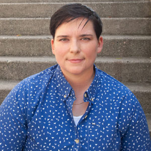 Mary Bellard sits on outdoor steps