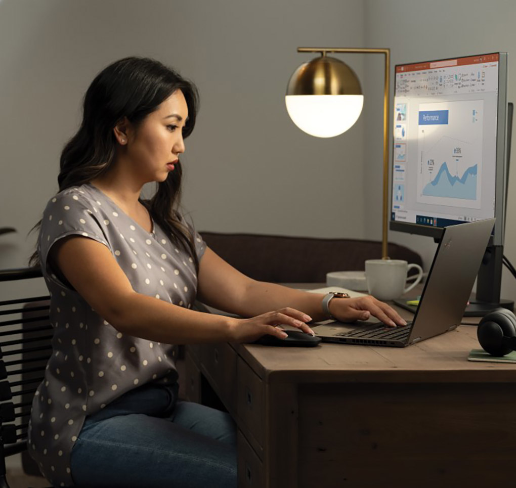 Woman working on a finance application on her laptop computer