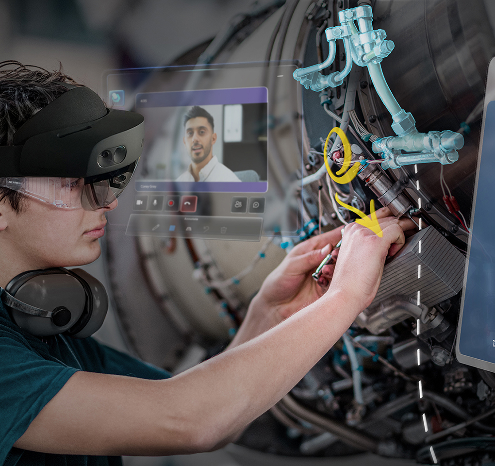 Person wearing a HoloLens device while working on an aircraft engine