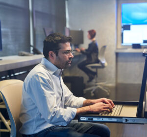 Man working at a laptop computer