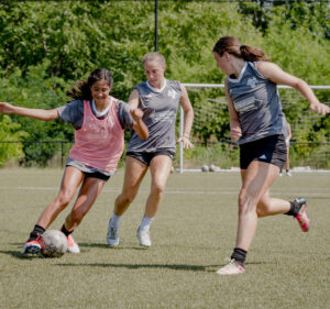 Girls playing soccer