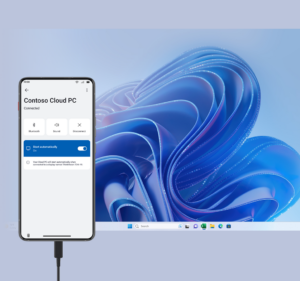Mobile phone connected to Cloud PC next to Windows 11 desktop