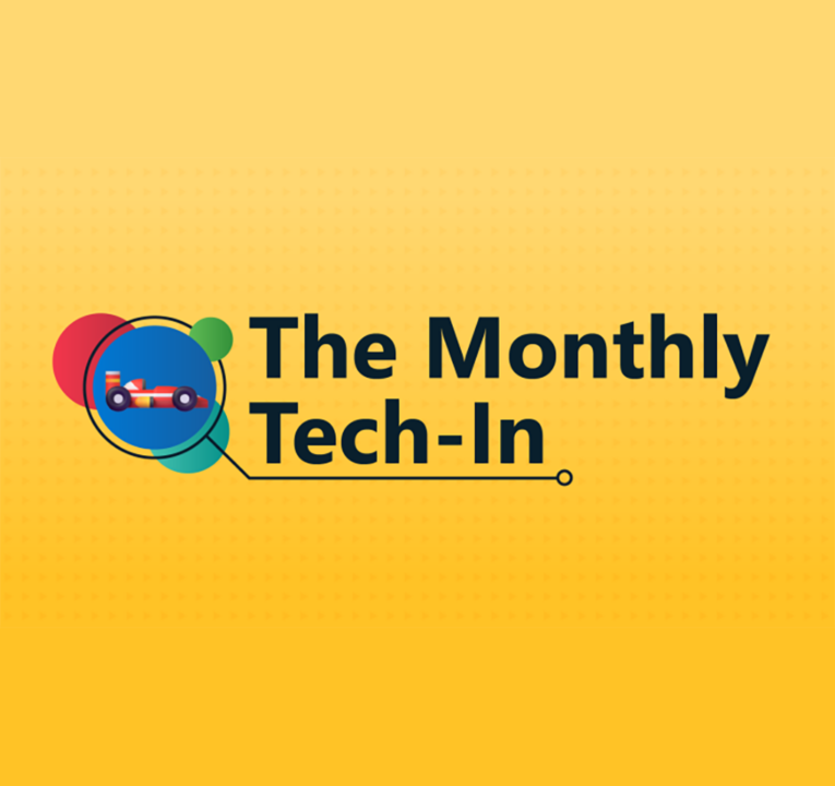 The words the monthly tech-in, next to an image of a racecar