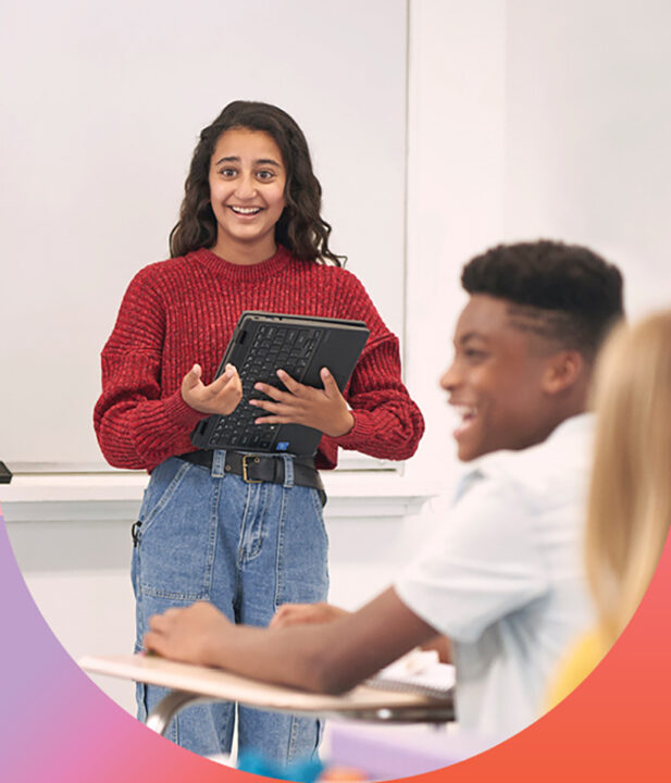 Teenage student addresses a classroom of her fellow students