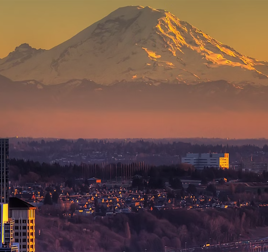 Mount Rainier at sunset with Downtown Seattle in the foreground