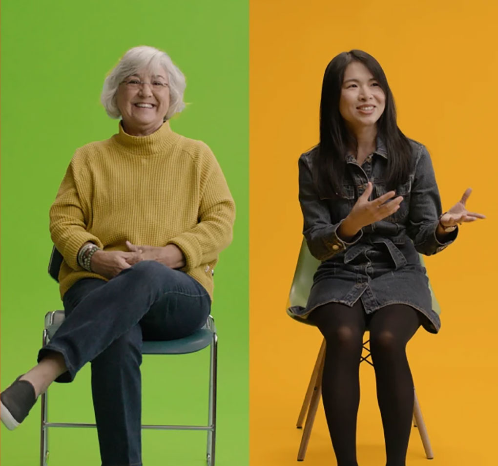 Two women seated in chairs