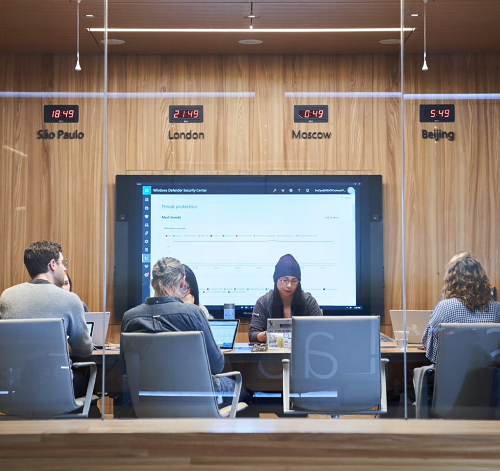 People sitting around a table in a conference room