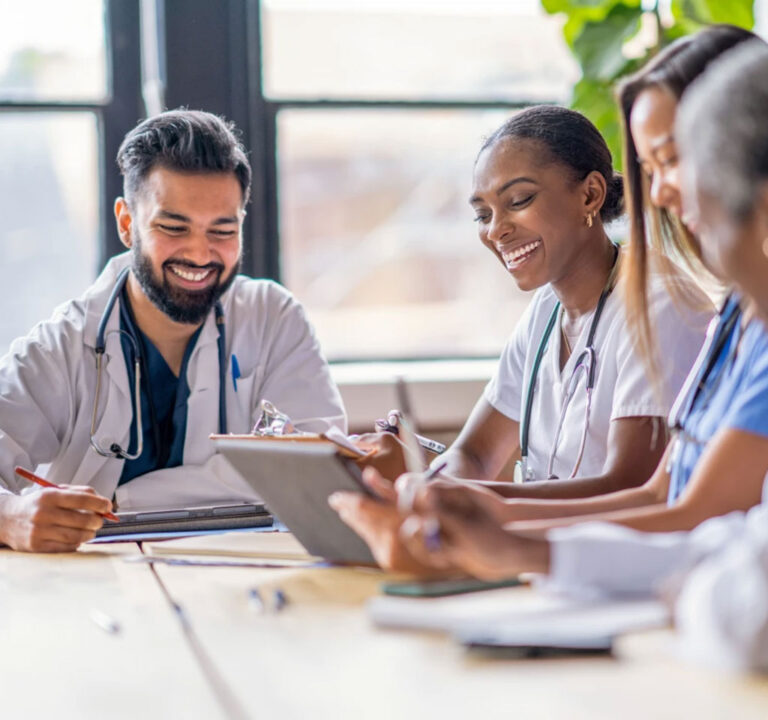 Medical professionals at a conference table