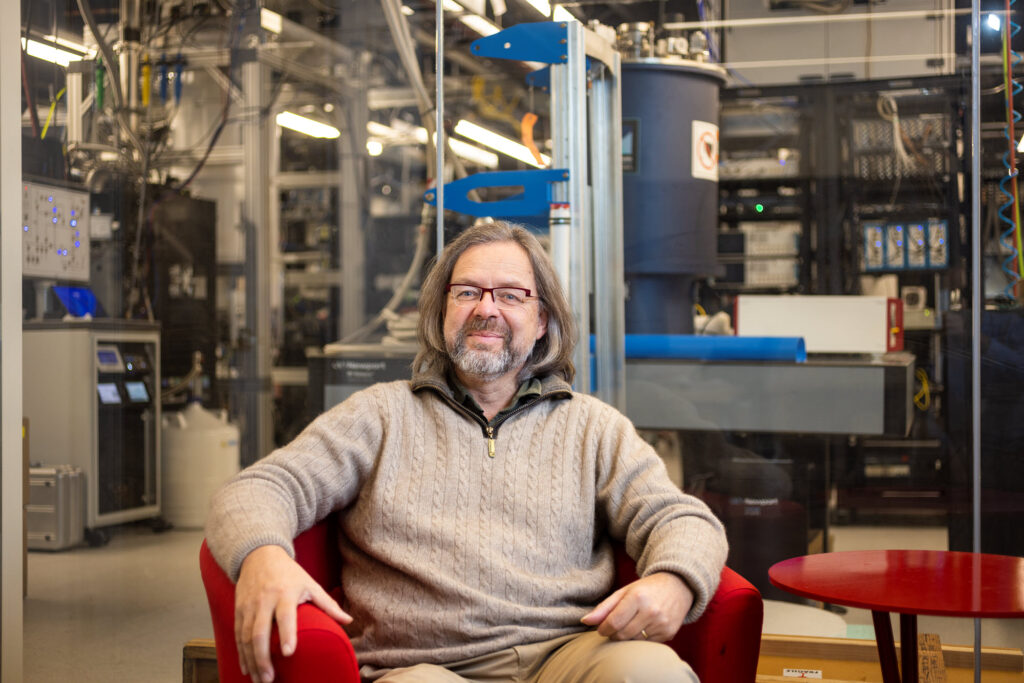 Photo of Matthias Troyer, Microsoft technical fellow, sitting in a lab. 