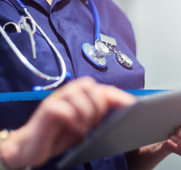 Nurse holding a tablet device