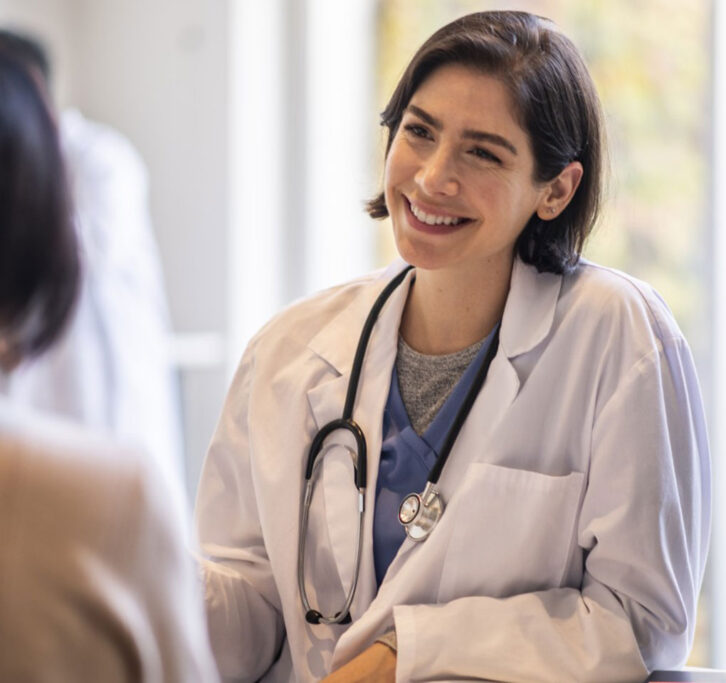 Doctor talking with a patient